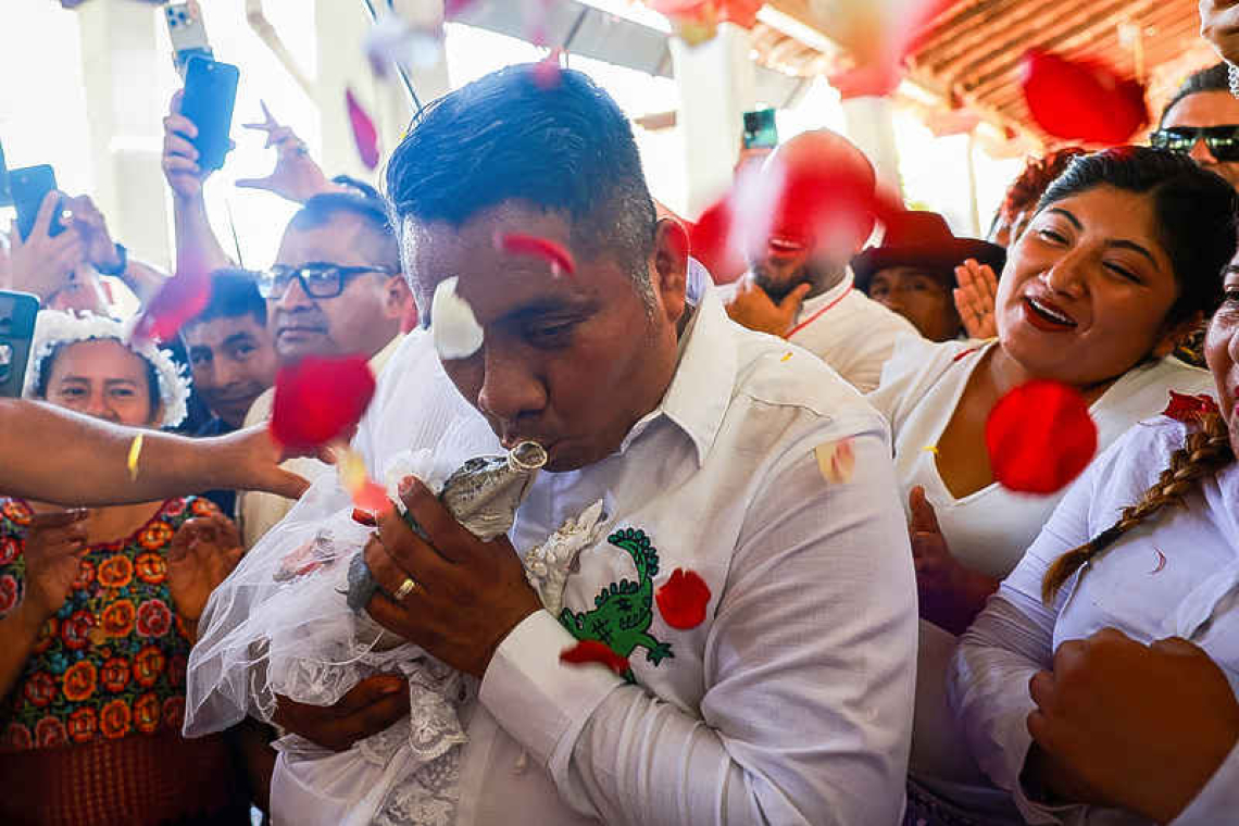 Mexican town mayor says 'I do' to caiman reptile in colourful tradition